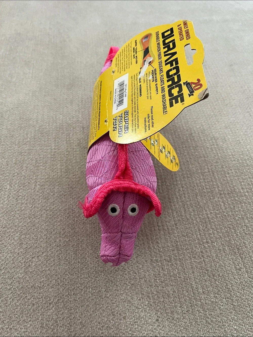 Durable Pink Dog Tug Toy by DuraForce Tuffy - Reinforced Plush